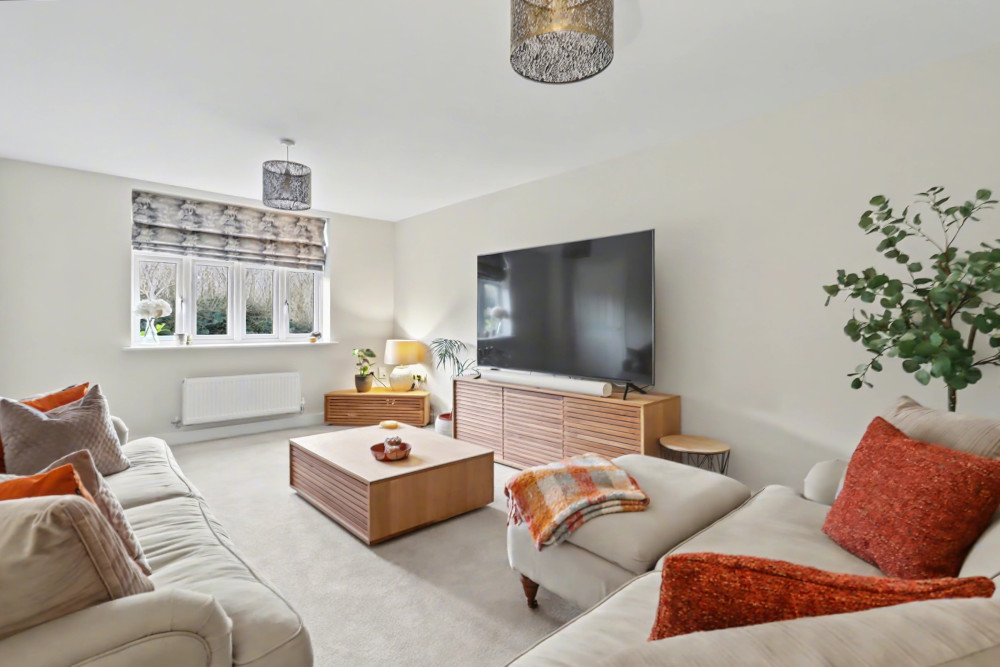 Elegant formal sitting room offering a peaceful retreat, perfect for relaxing evenings and entertaining guests