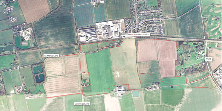  257 acres of farmland between the red line will be filled a 2,100 home development.