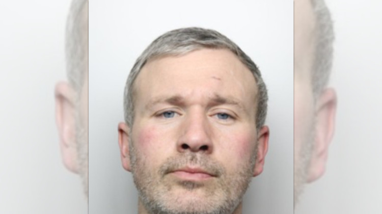 Police are appealing for information to help find Martin Blinston, who is wanted on recall to prison and is believed to have links to Stockport (Image - GMP)