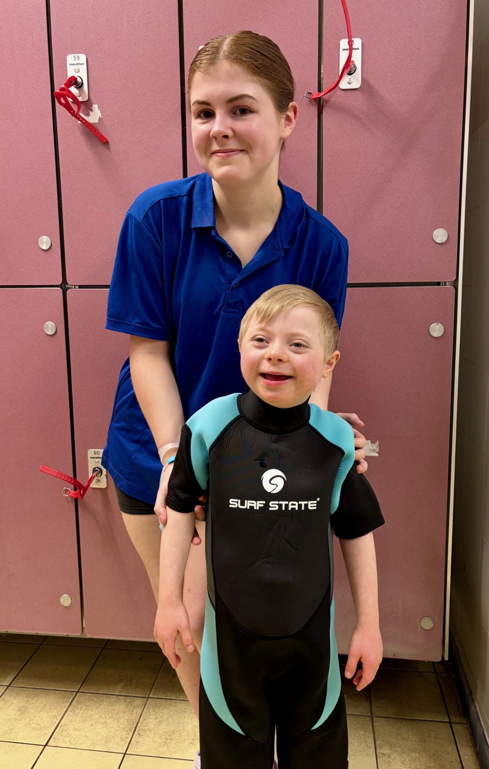 Swimming teacher Molly with a delighted Gabriel. (Photo: Everybody Health & Leisure) 