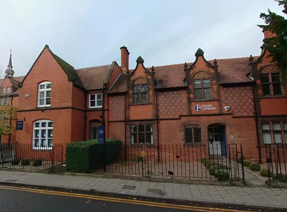 Plans include converting the currently "redundant" office building, to create one three-bed and five two-bed apartments (Image via: Google)