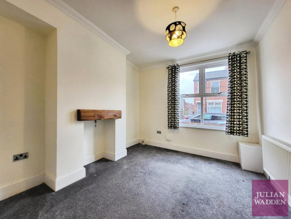 Our friends and sponsors at Julian Wadden present their property of the week - this charming end terrace in Reddish, with a modern finish throughout (Image - Julian Wadden)