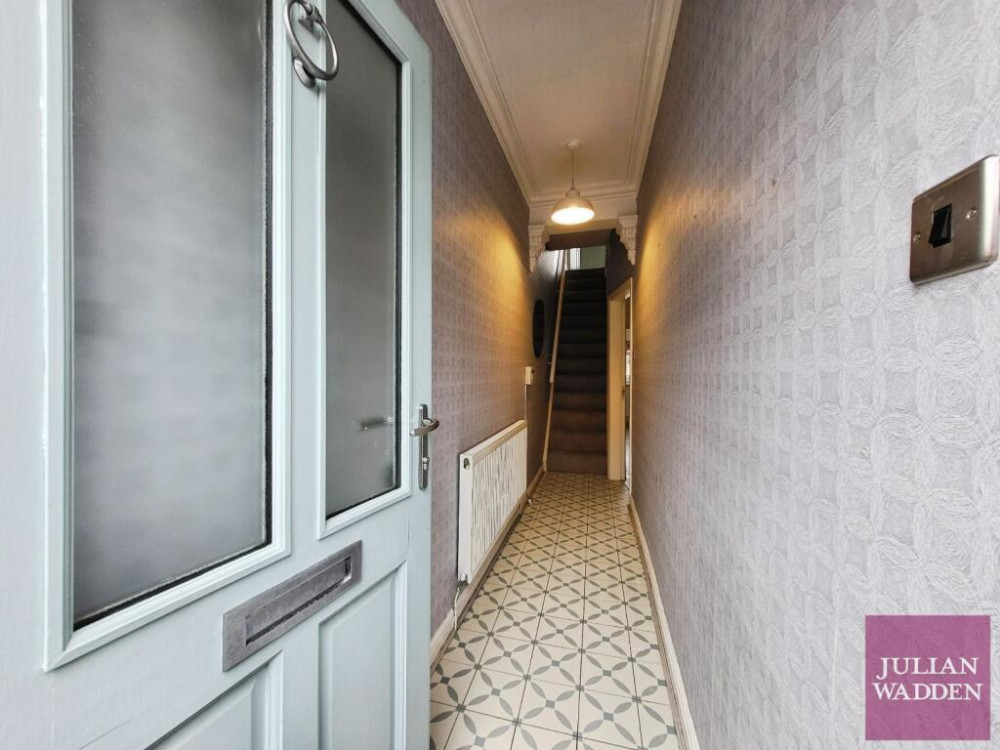 Our friends and sponsors at Julian Wadden present their property of the week - this charming end terrace in Reddish, with a modern finish throughout (Image - Julian Wadden)