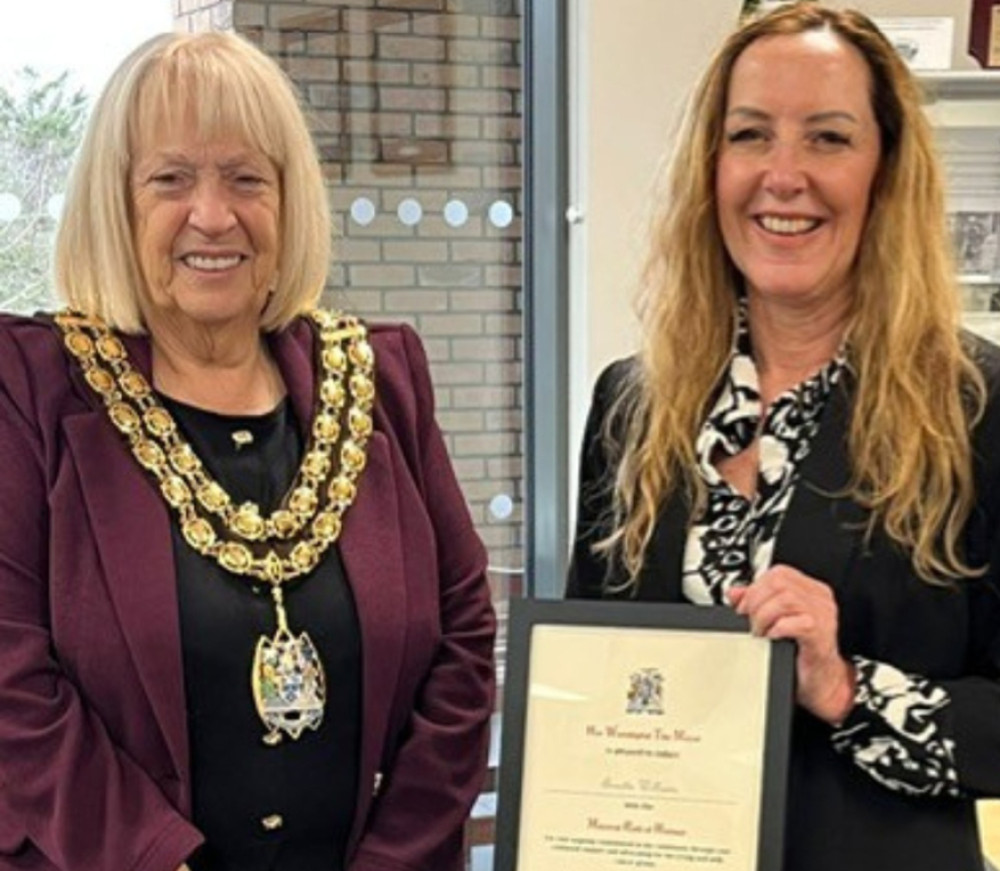 Annette Williams received her aaward from mayor Cllr Sue Shinnick.