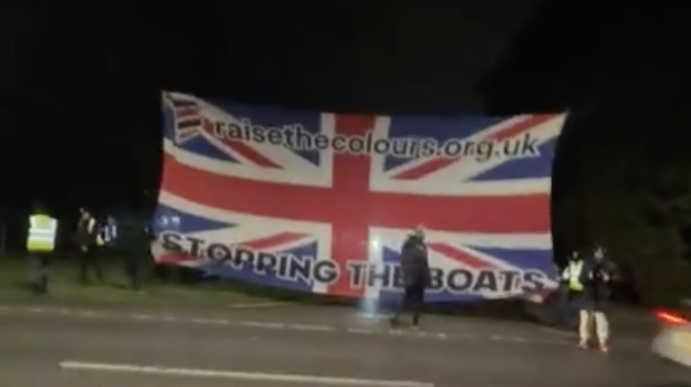 A temporary banner displayed outside the Delta Hotel last night