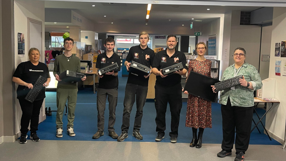 Cllr Vikki Hartstean (second from right) with staff from Every Child Online and Grays Library