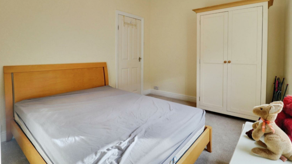 One of the three bedrooms (image via Stephenson Browne)