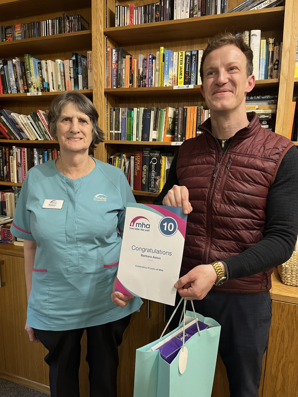 Barbara Aston, care assistant with and Alistair Strathern, MP for Hitchin