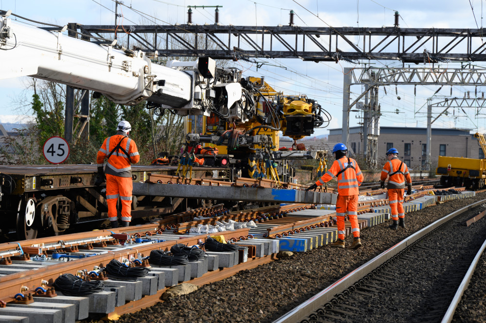 Track panels being dropped into place during upgrade work outside Manchester Piccaddilly (Image - Network Rail)