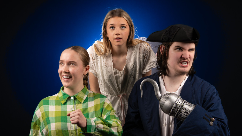 Fly to Neverland with the Talisman Youth Theatre’s production of Wendy and Peter Pan - Hannah McDermott as Peter Pan, Olivia Leaf as Wendy and Matthew Jolliffe as Captain Hook (image by Gwyn Davies)