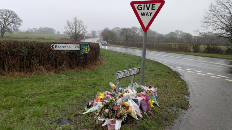 Flowers have been laid at the roadside in memory of the off-duty police officer who died in a car carash. (Photo: Nub News)
