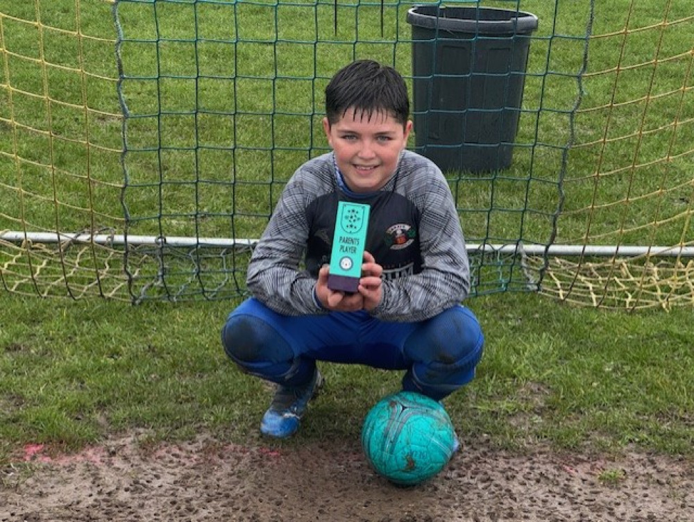 Archie now enjopys a 'normal life', including playing football. 