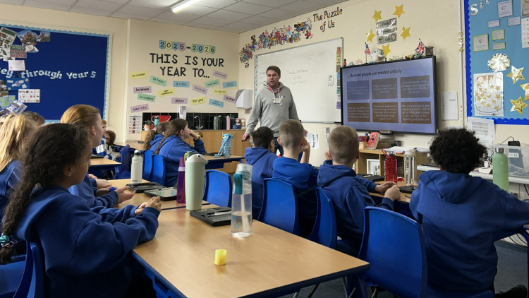White Ribbon Ambassador Robert Hemsley talks to Year 5 at The Quinta (Credit: CTC)