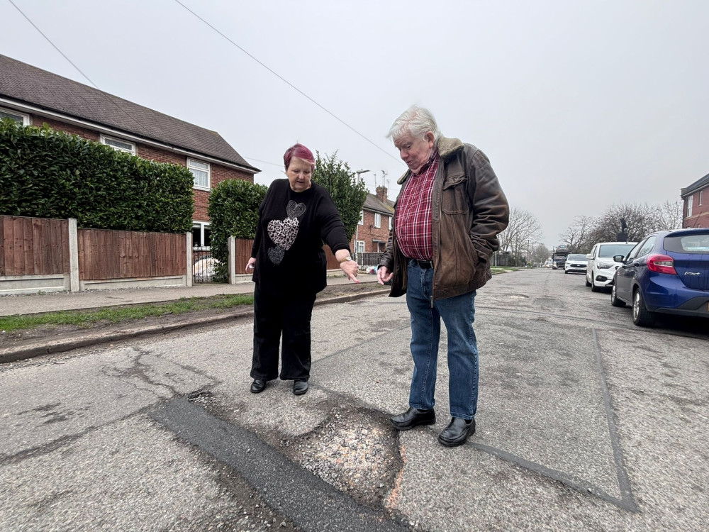 Pat and Phil Rackley survey the state of roads in Laindon 