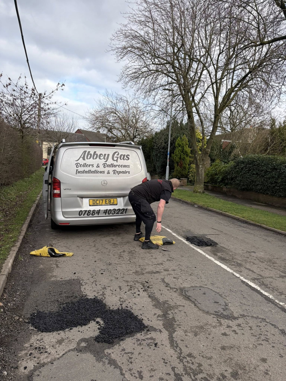 Alsager dad, Lee Beresford, was so fed up with the number of potholes in the road near his home that he's filled them himself. (Photo: Lee Beresford)