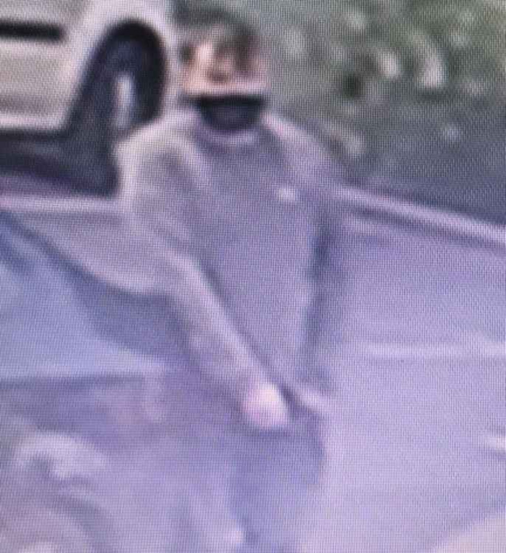 One of the two men suspected of being involved in the theft One of the two men suspected of being involved in the theft