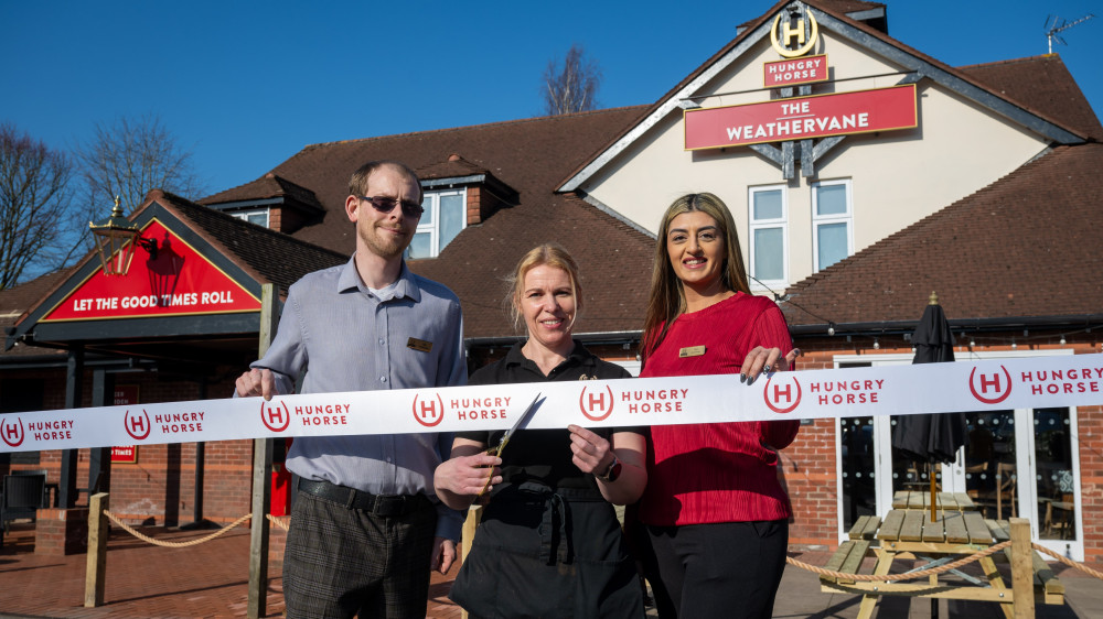 Zena Gallimore, the pub's longest serving team member, cut the ribbon marking the pub's official opening (image via Greene King)