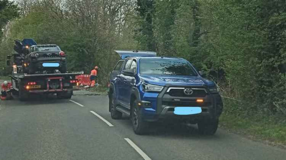 The black mini is taken away on a truck - luckily nobody was injured. Photo: Swadlincote SNT