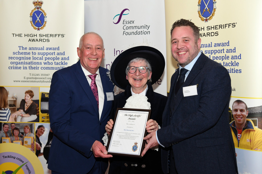 Davcid Barton, right, received the award. 