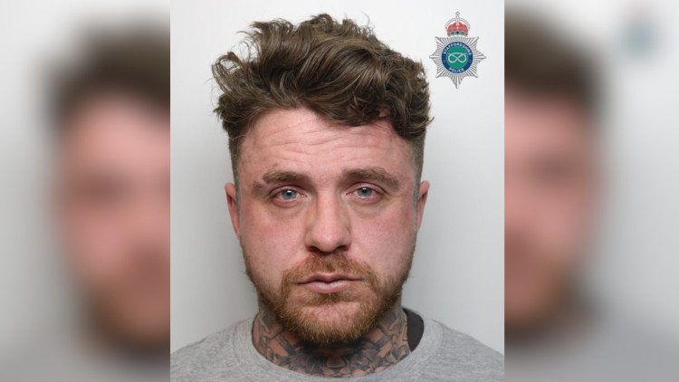Shane Davis (pictured) and Lauren Leese pleaded guilty to unauthorised accessing of computer material at Stoke-on-Trent Crown Court (image via Staffordshire Police)