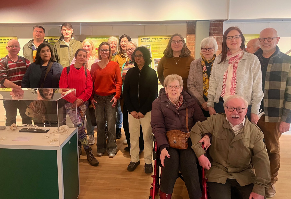 Volunteers, organisers, staff and the public at the exhibition at North Herts Museum