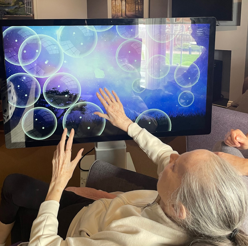 Crandon Springs resident Sue enjoyed popping bubbles on the screen with fun sound effects adding to the enjoyment.