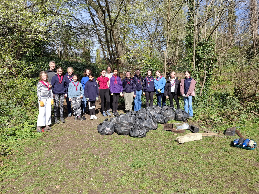 Holy Saviour Guides with some of the rubbish they collected from the Dell