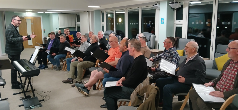 The 'All Men Can Sing' choir in rehearsals