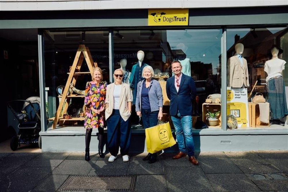 Journalist Kate Adie opens a Dogs Trust charity shop in Wells, a new venture supporting dogs, with donations and volunteers welcome.