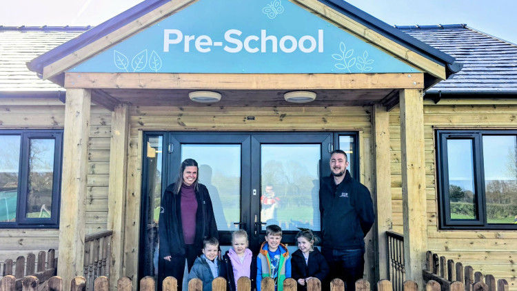 Thrive Weston Village, Main Road, launched its new pre-school building on 14 March, with Nursery Manager, Emma Mainwaring and Director at RCB Construction, Nathan Burge pictured with delighted children (Photo: Ryan Parker).