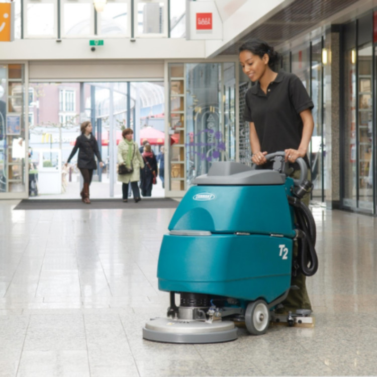 A commercial scrubber dryer in action, delivering fast, hygienic cleaning while leaving floors safe and ready for immediate use