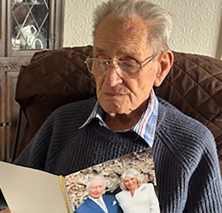 Roy Thorndyke wth his card from King Charles