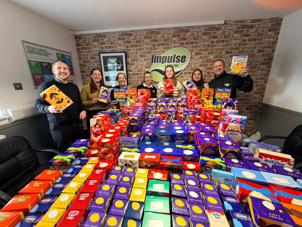 Staff at Impulse Leisure with the donated Easter eggs