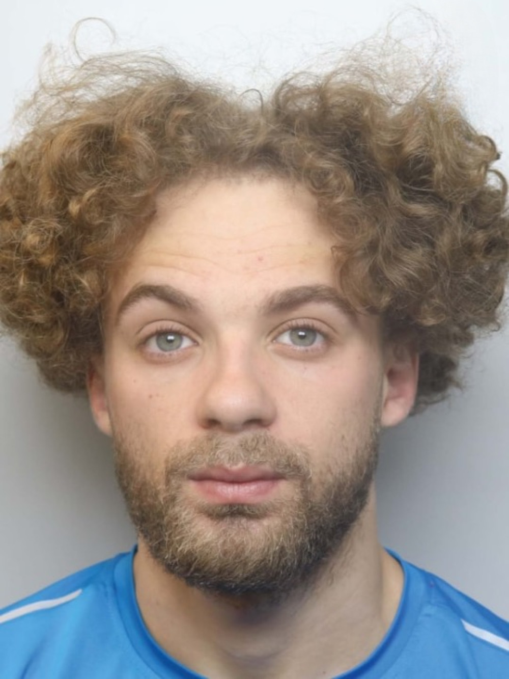 Kai Dodd, 26, is wanted in connection with breaching a restraining order (Photo: Cheshire Police).