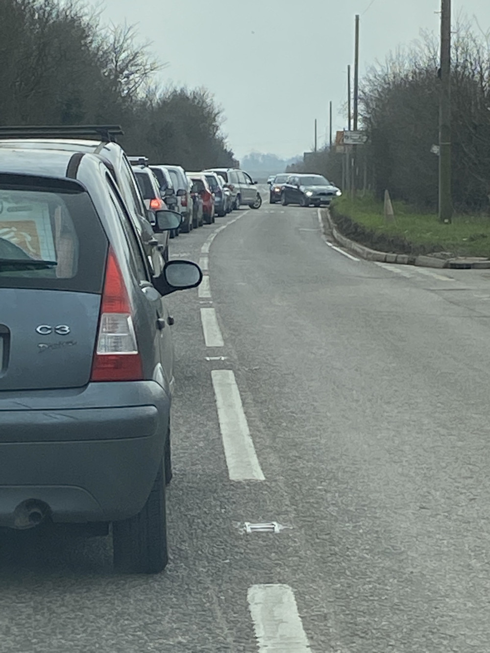 Queuing traffic on Buckingham Hill Road has become a common sight. 