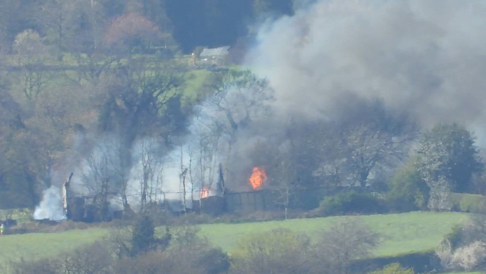 Firefighters remain at the scene of a barn fire near Congleton (Credit: Simon Stewart)