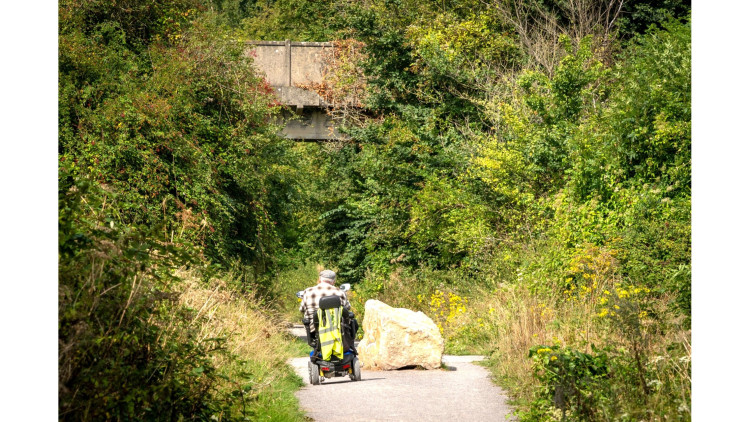 Wells City Council, Somerset Council and Accessible Wells say partnership work is helping improve access across the city, from pathways and signage to meeting venues.