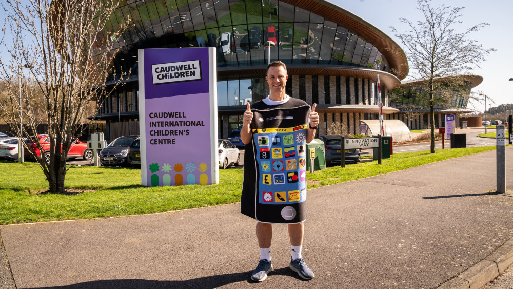 Nick Holland will be completing the TCS London Marathon dressed as a mobile phone (image via Caudwell Children)