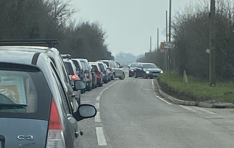 Queuing traffic outside the tip has been a long term issue.