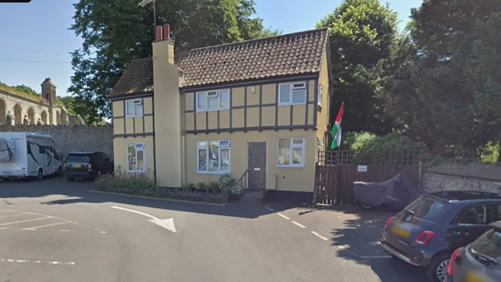 Glastonbury Town Council has voted to seek demolition of St Dunstan’s Cottage and turn the site into extra parking.