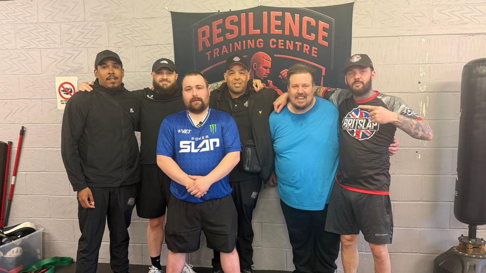 Ryan Cooper with his coach and team in Manchester (image via Ryan Cooper)