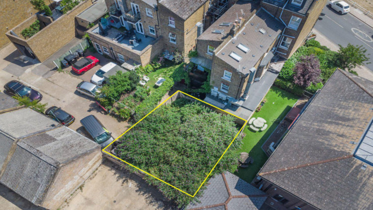 A family's plans to build a rear home on their property on The Green, Twickenham have been rejected (credit: Planning application).