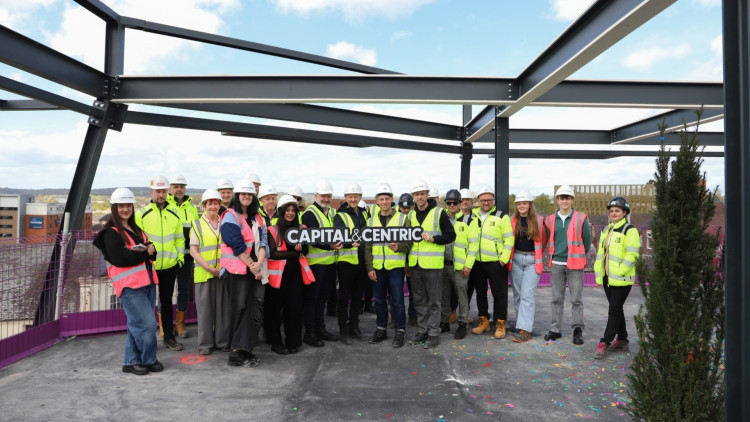 The milestone was marked on site with the project partners and construction team (image via Capital&Centric)