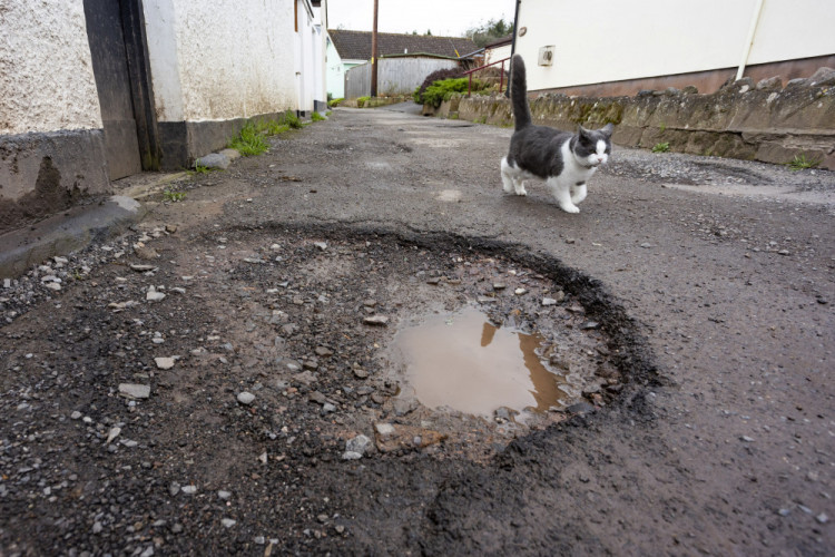 Nearly 3,000 pothole reports were received in February alone across the county (image via SWNS)