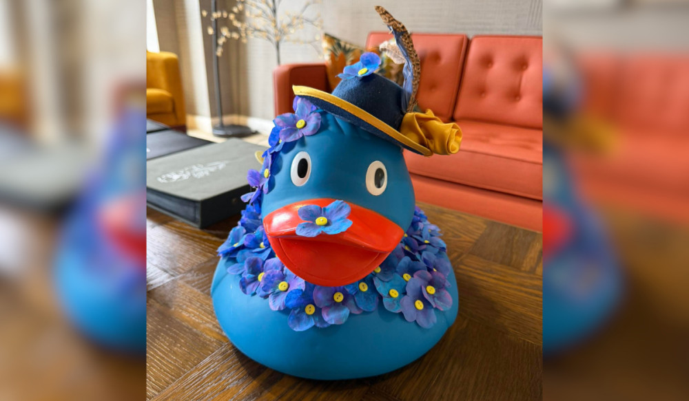 Ali features hand-painted blue myosotis - better known as forget-me-nots, a symbol of dementia awareness (Image supplied)