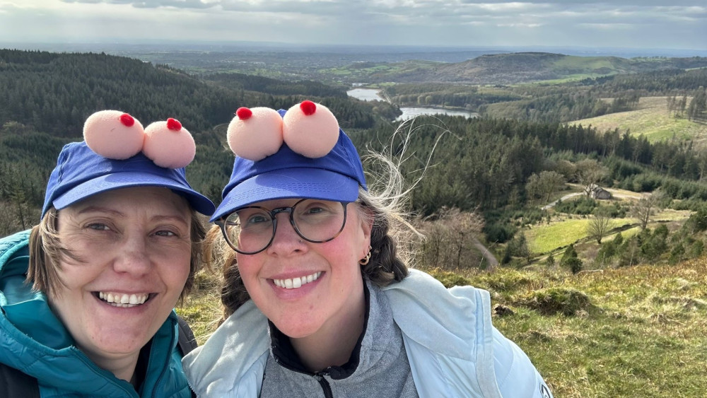 Beth and Anita wearing their 'conversation-starting' boob caps (Image supplied)