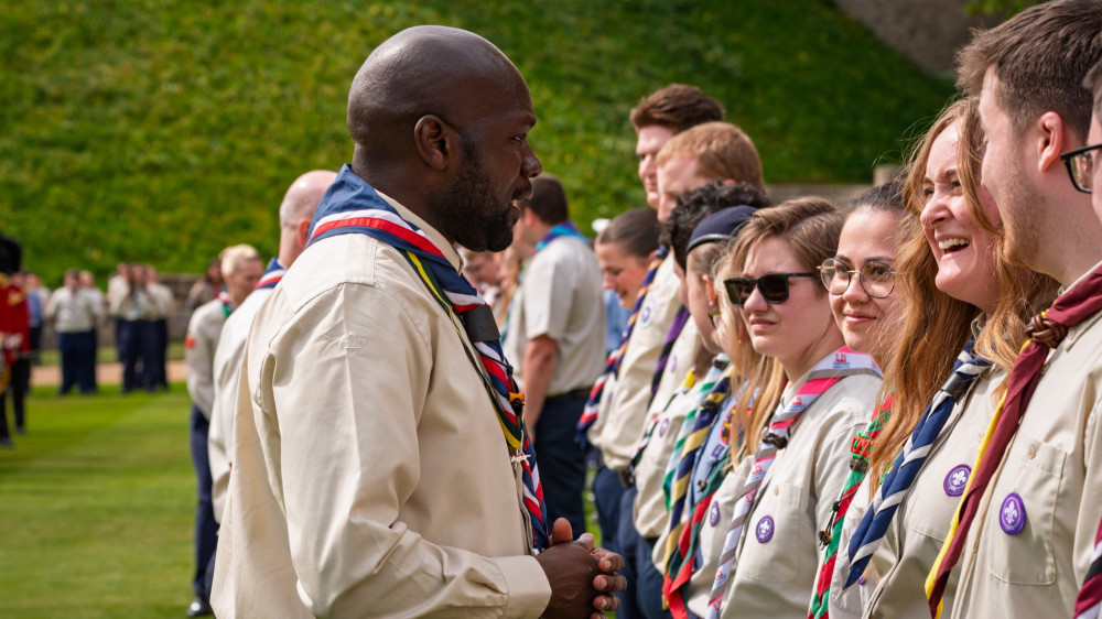 Chief scout Dwayne Fields presents scouts with their awards (Image supplied)