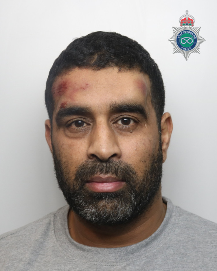 Khan (above) refused to take a breath test in custody (image via Staffordshire Police)