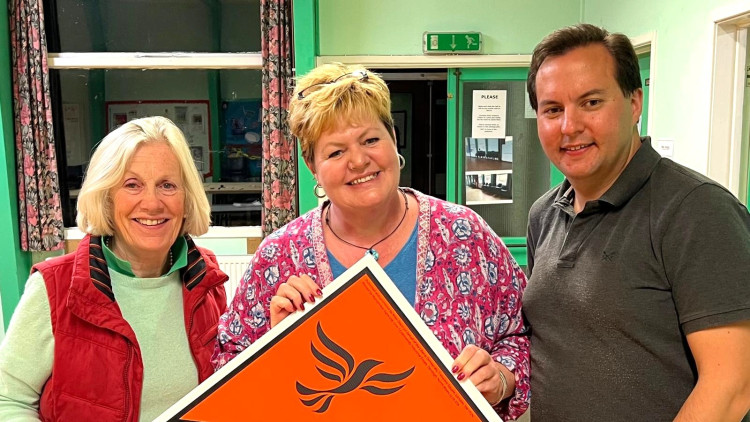 The newly elected Liberal Democrat Wells City Councillor for St Thomas' ward, Cllr Kat Kinshaw (centre) with MP Tessa Munt and Cllr Theo Butt Philip. 