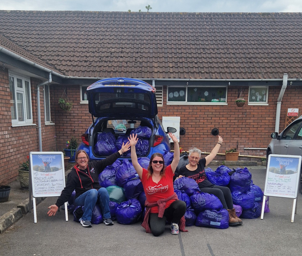 Consultants Ally, Sarah & Christina proudly showing off the purple bags